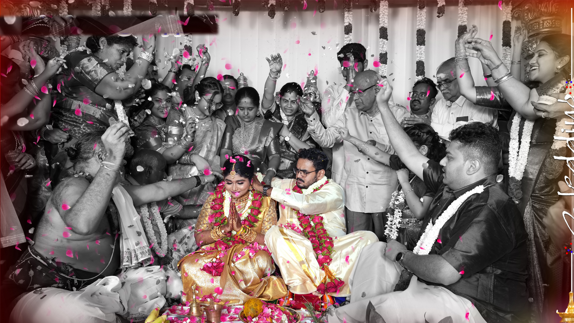 total family are black background except groom and bride in wedding photography